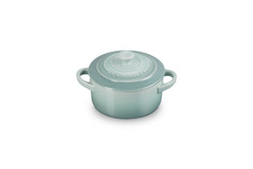 Le Creuset mini round cocotte in sea-salt glaze, offering portioned meals.