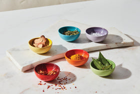 Le Creuset pinch bowls in multi colors for spice staging and table service.