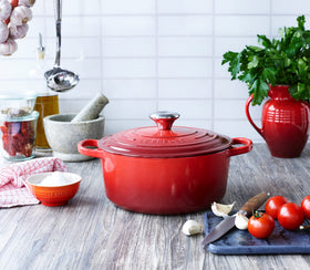 Lid close-up on Le Creuset Cerise Dutch oven highlighting tight seal