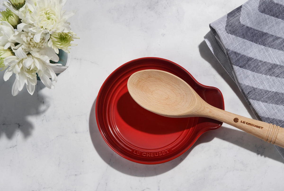 Close-up of Artichaut glaze on Le Creuset spoon rest shows a smooth, chip-resistant surface.