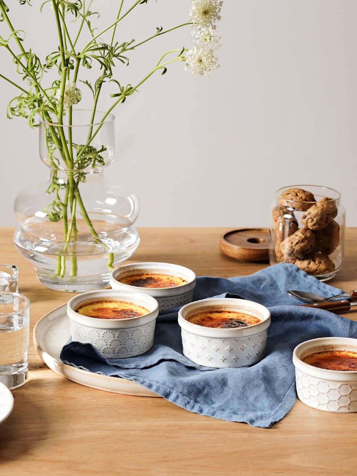 LE TAUCI ramekins on dining table for desserts and dips.