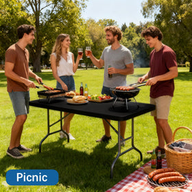 Lemict outdoor table cover showing elastic edge grip during a windy picnic setup.