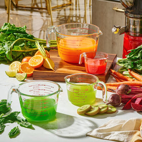 Le'raze 8-cup glass measuring cup side view highlighting the ergonomic handle for comfortable pouring.
