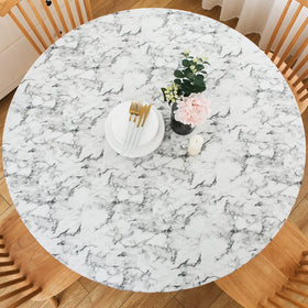LIBERECOO round tablecloth with flannel backing for a secure 57-65 inch round fit.