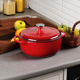 Lodge dutch oven interior view in Island Spice Red enamel for even heating and easy cleaning.