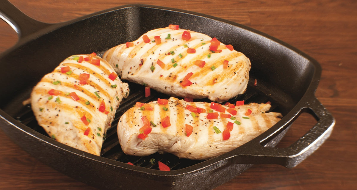 Lodge Square Grill Pan burger sear with raised ridges shaping authentic grill marks