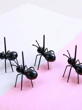 Loizziuy ants fruit picks arranged on a party platter