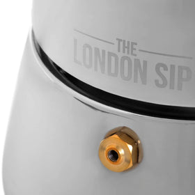 London Sip moka pot pouring espresso into cup for tasting.