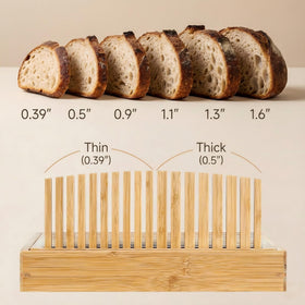 LukieBoee bread slicer in action slicing a crusty boule with even thickness