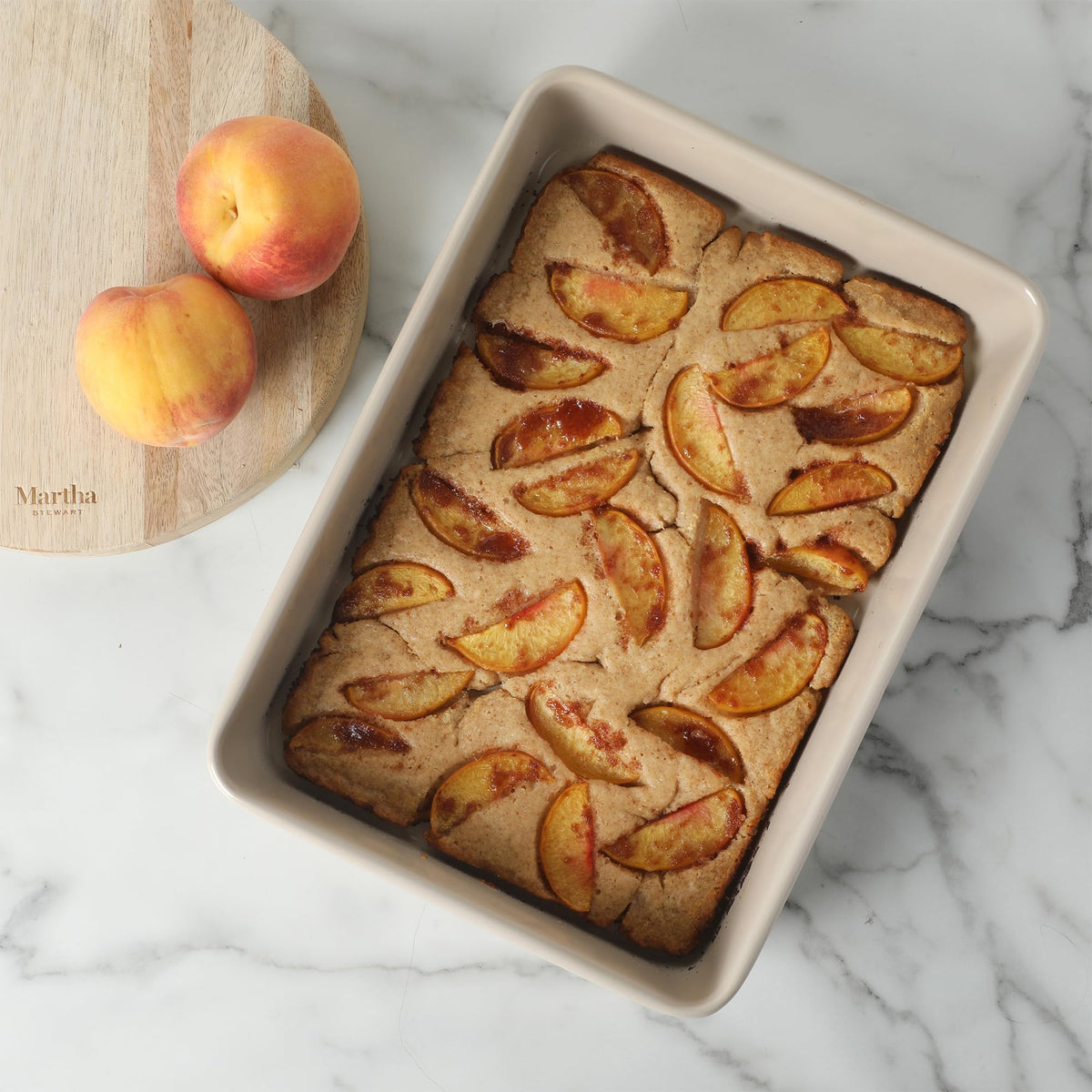 Martha Stewart Gallen 8-inch round cake pans support layered cakes with smooth edges.