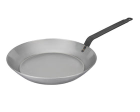 Matfer Bourgeat carbon steel frying pan searing meat with even heat and fast browning