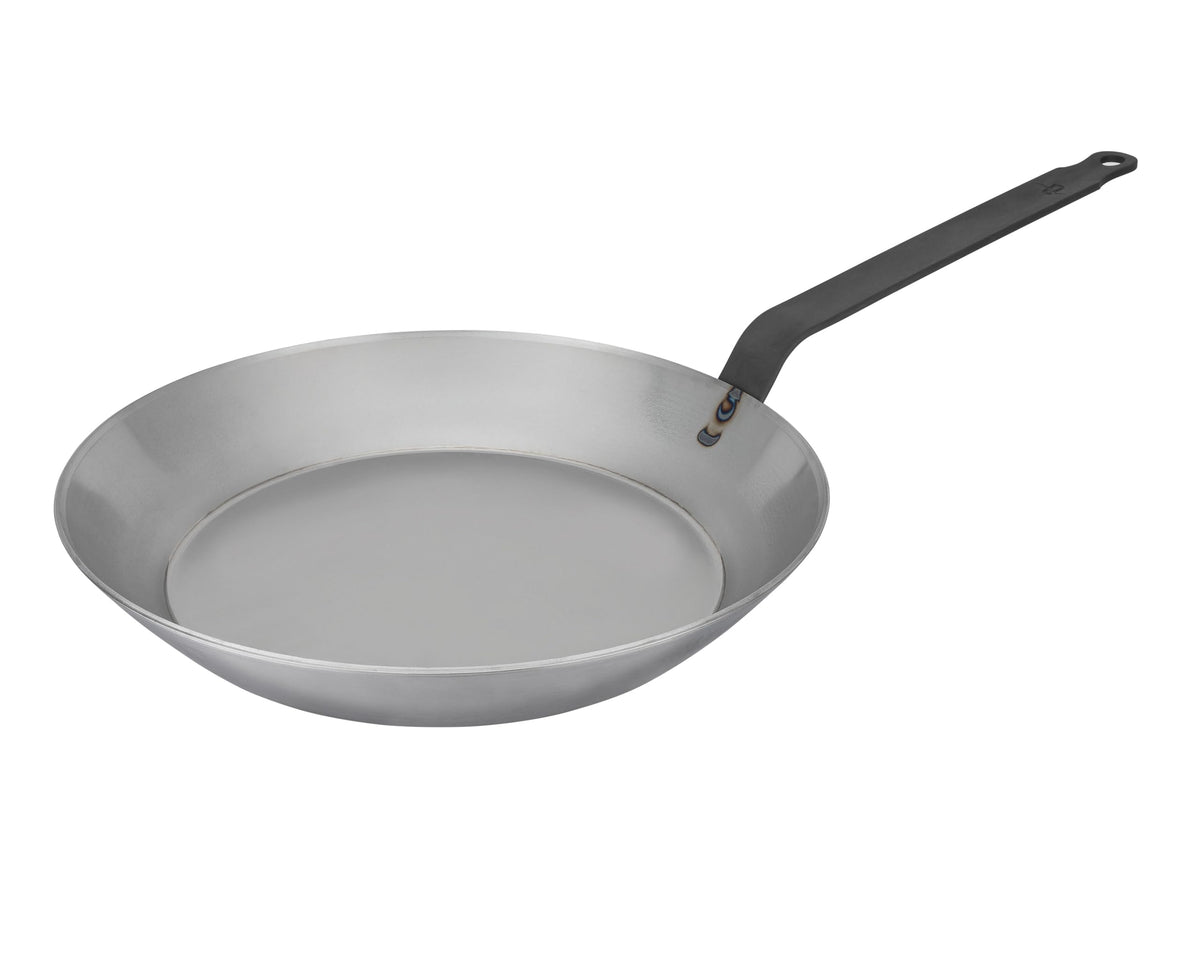 Matfer Bourgeat black carbon steel pan top view highlights even heating for searing