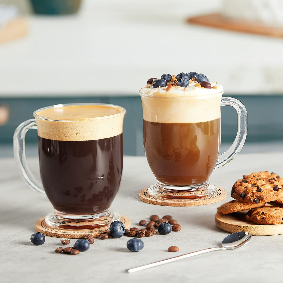 Mfacoy kitchen scene shows four clear mugs arranged for entertaining guests.