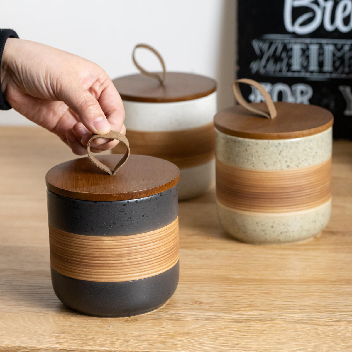 Miamolo rope-lid ceramic jar highlights decorative kitchen storage.