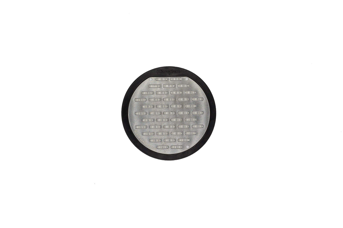 Microplane jar lid grater fine blade for zest and fine cheese grating.