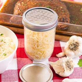 Using the Microplane jar lid grater for salads and vinaigrettes.