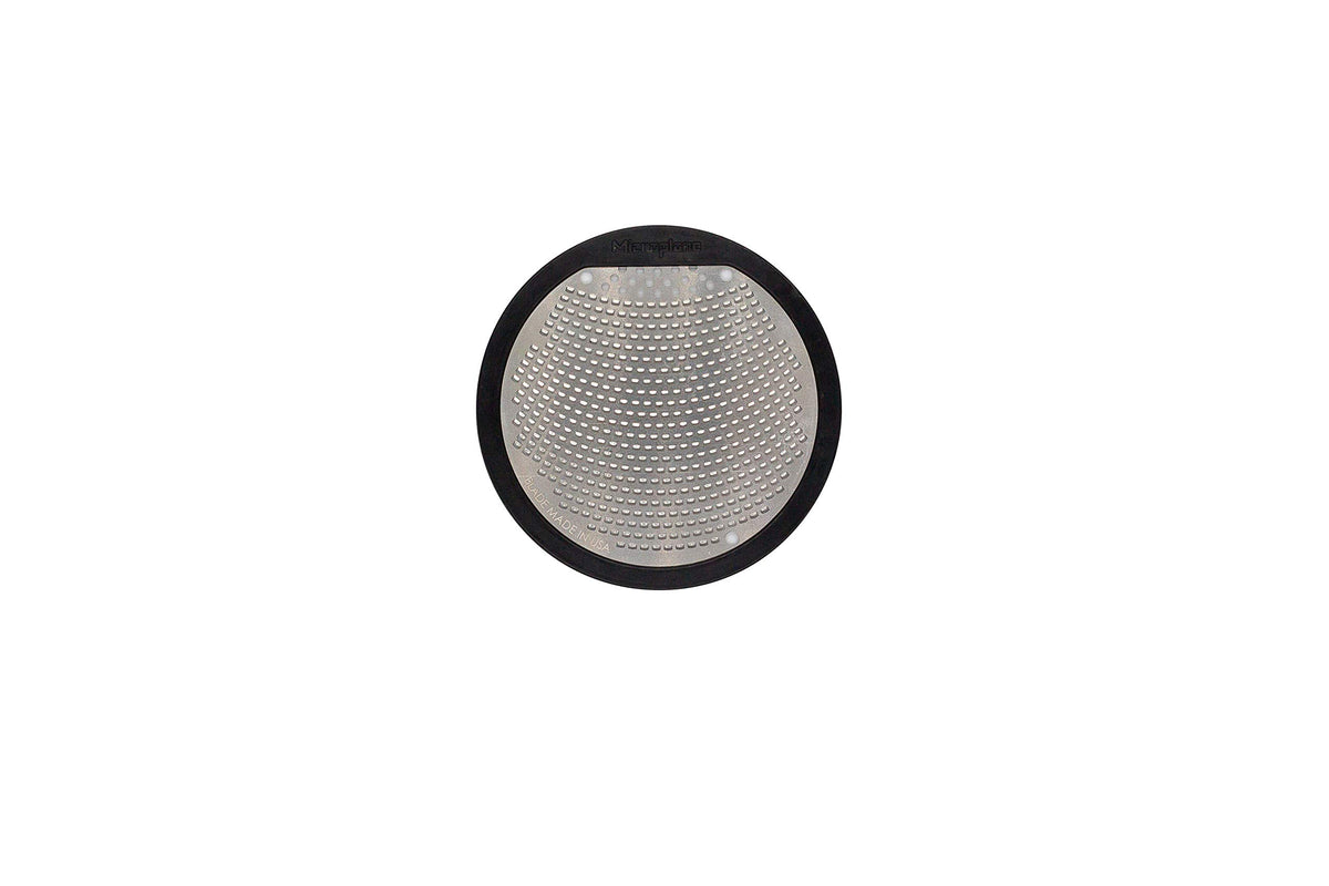 Perimeter shaker holes on Microplane jar lid grater enable even seasoning.