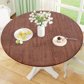 Misaya round fitted tablecloth with elastic edge for a snug, wind-resistant fit.
