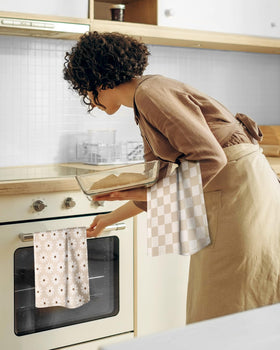 Miss Adola flour sack towels decor idea in a cozy beige kitchen display