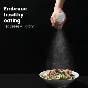 Mistifi glass oil sprayer shows fine-mist-nozzle for uniform seasoning.