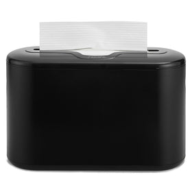 Modunful multifold towel dispenser on countertop provides quick access and tidy spaces.