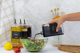 Dust-proof spout on Molimoli pourer keeps contents fresh between uses