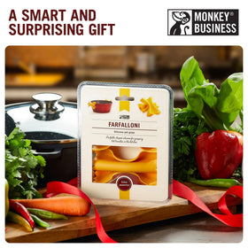 Monkey Business pasta-inspired kitchen gadget, adds playful style while handling hot cookware.