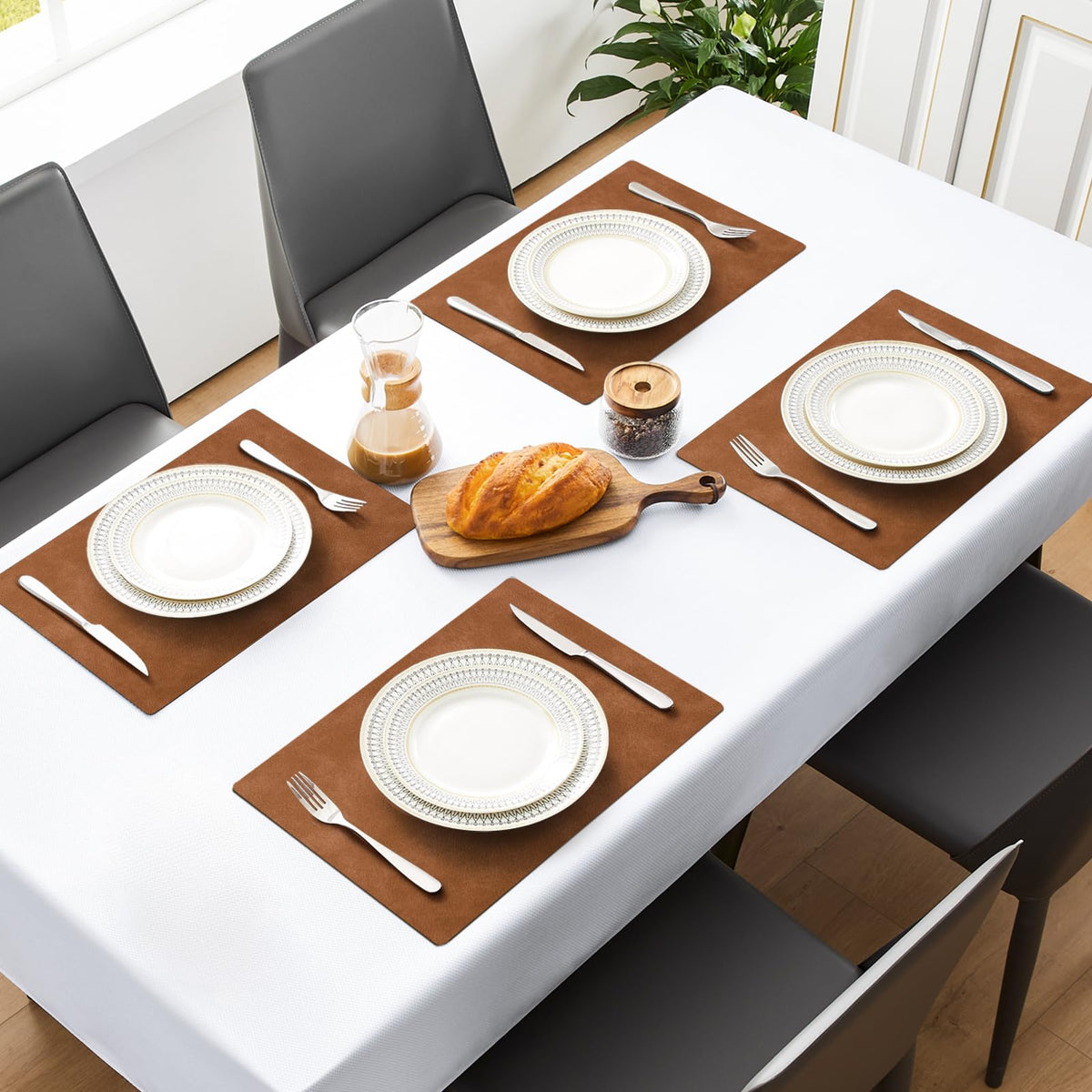 Close-up of MOSAYT faux leather texture on placemats for tactile style