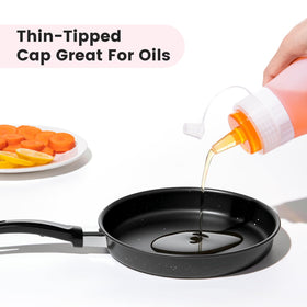 Mrsdry bottle with interchangeable lids for precise oil and syrup dispensing.