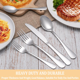 MUTNITT elegant table setting featuring mirror-polished flatware