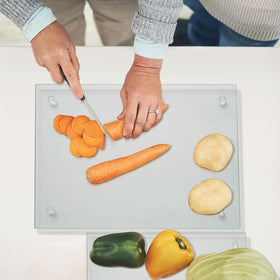 Mymonfif glass cutting board with non-slip feet on counter surface