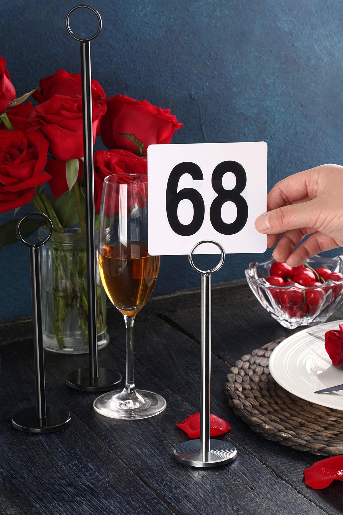 Set of 12 demonstrates consistent signage across multiple tables at an event.