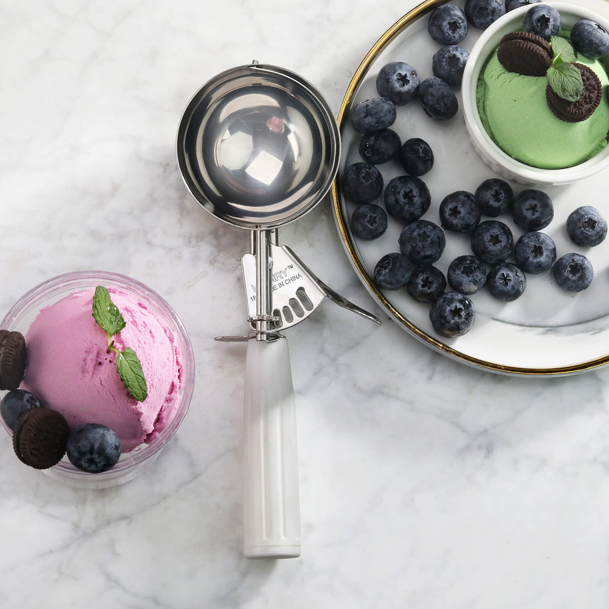 New Star Foodservice disher with color-coded handle for easy sizing