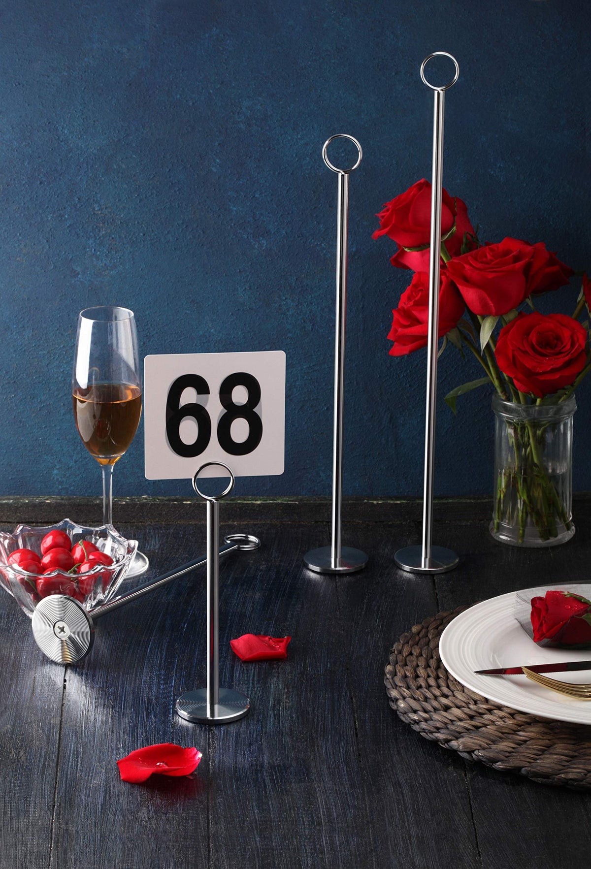 Matte black finish table-number stand complements contemporary decor.