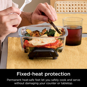 Ninja CleanCrisp heat-protection feet guard surfaces during cooking and cooling.