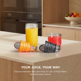 Ninja NeverClog 24oz juice jug for family-friendly juicing batches.