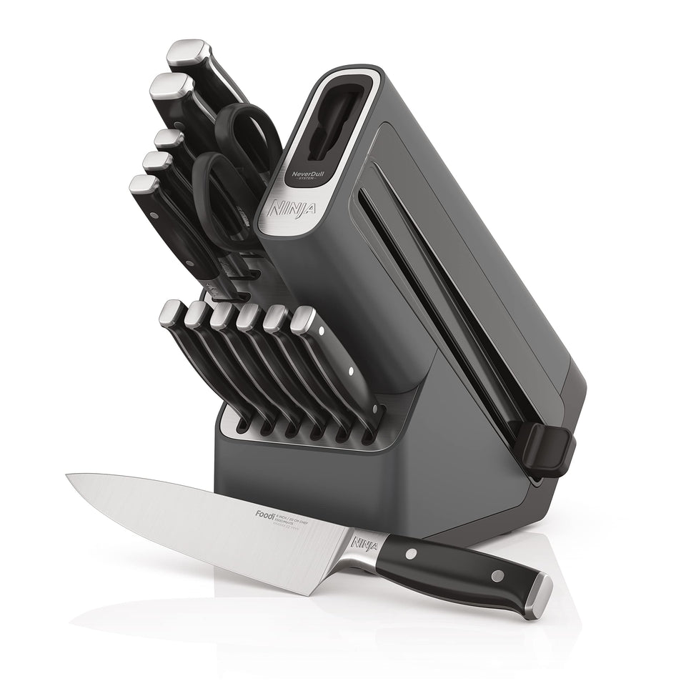 Ninja NeverDull knife block on counter with blades ready for precise slicing.