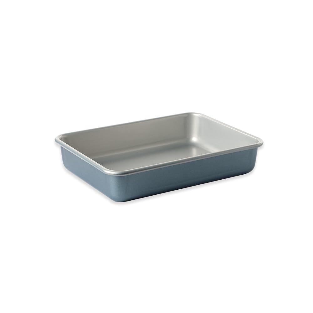 Nordic Ware Brilliant pan with blue exterior for even browning and clean release.