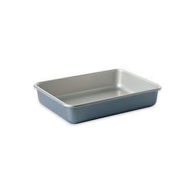 Nordic Ware Brilliant pan with blue exterior for even browning and clean release.