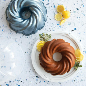 Nordic Ware lightweight formed aluminum heats evenly to prevent warping.