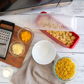 Nordic Ware cooker engraves rings to measure pasta portions precisely.