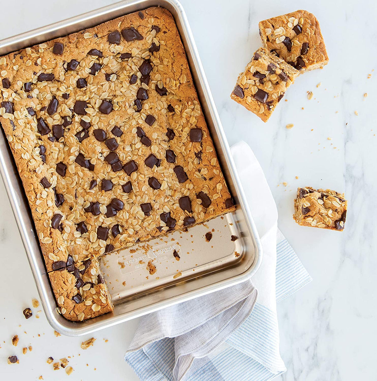 Nordic Ware pan with parchment ready for easy cleanup.