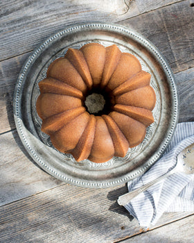 Nordic Ware Bundt 12cup Toffee side view emphasizes even browning and steady heat distribution