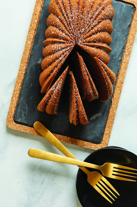 Nordic Ware swirl heritage Bundt design adds sculptural elegance to desserts.