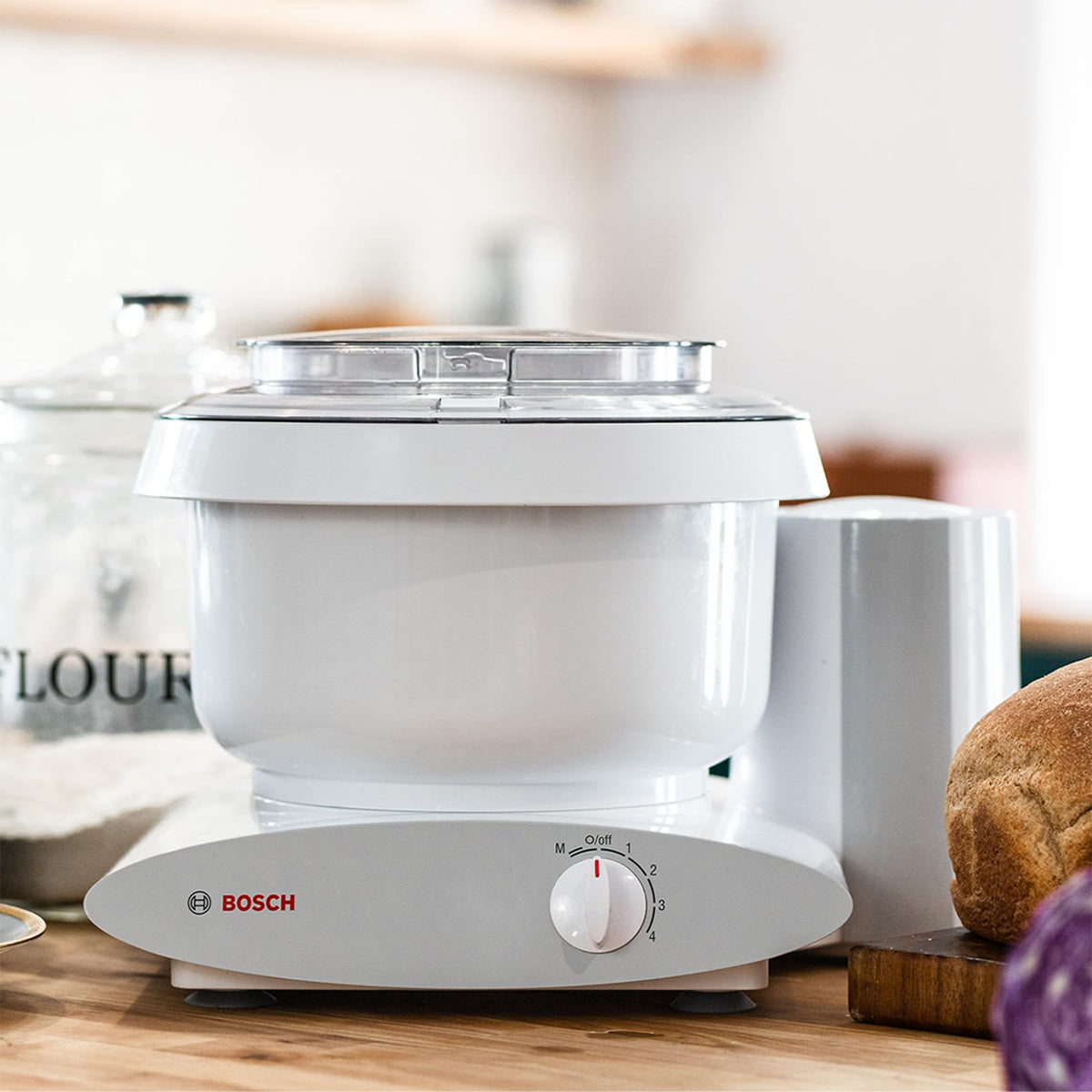 Nutrimill Bosch Universal Plus stand mixer bottom-drive design simplifies adding ingredients mid-task.
