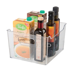 Oggi clear pantry bin with handles on a shelf for easy access