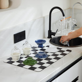 Ohocut absorbent vegan leather front keeps dishes and surfaces dry quickly.