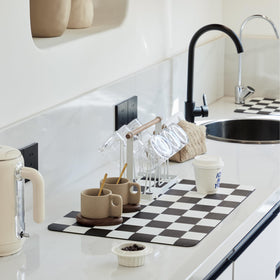 Ohocut checkered drying mat front absorbs spills quickly on countertops.