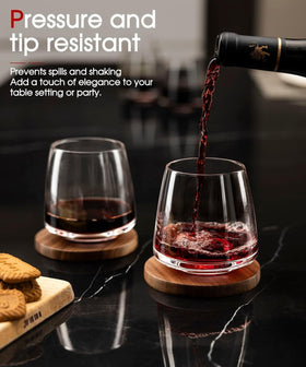 OJA glass with a wide base for stability and spill resistance.