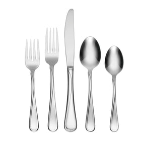 Oneida Flight 65-piece flatware set on dining table, ready for family meals.